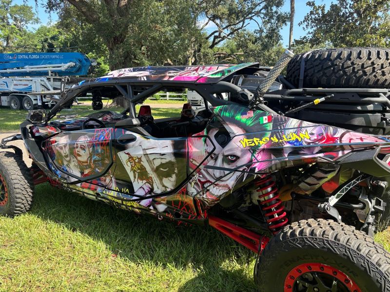 Off-road UTV with a full-color custom graphic wrap